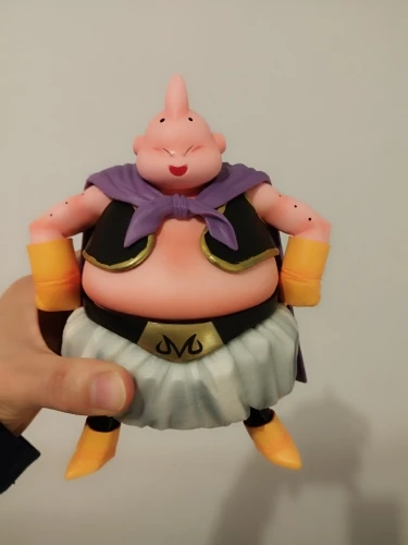 Foto de un comprador: Figura de Majin Buu de 20 cm con 4 cabezas de Dragon Ball Z