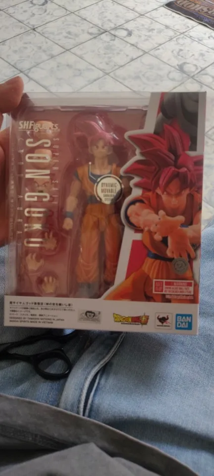 Foto de un comprador: Figura articulada de Super Saiyan God Goku con aura y 3 rostros