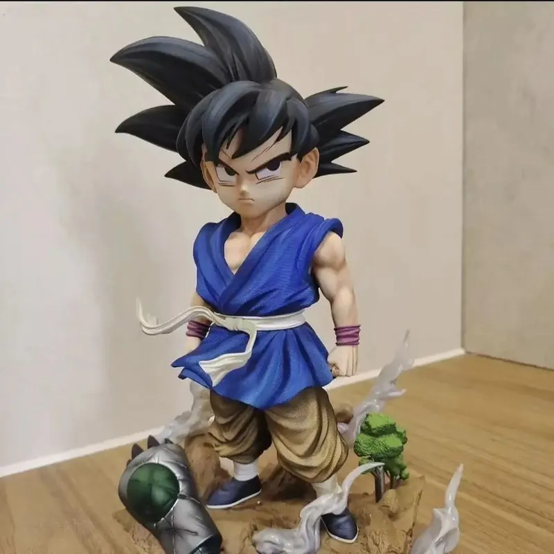 Figura de Son Goku de 25 cm con dos cabezas intercambiables