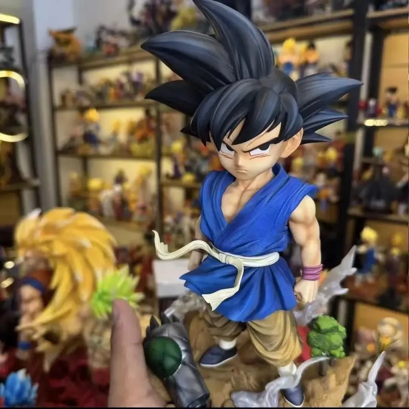 Figura de Son Goku de 25 cm con dos cabezas intercambiables – Desembala