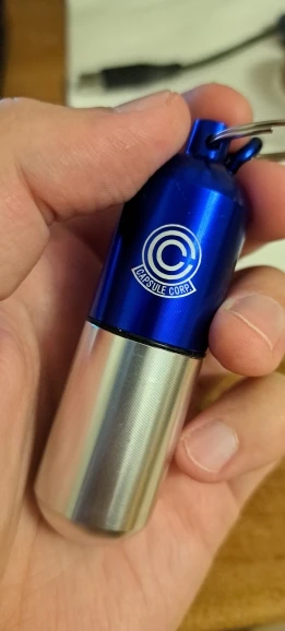 Foto de un comprador: Llavero de Dragon Ball de metal, organizador de pastillas portátil