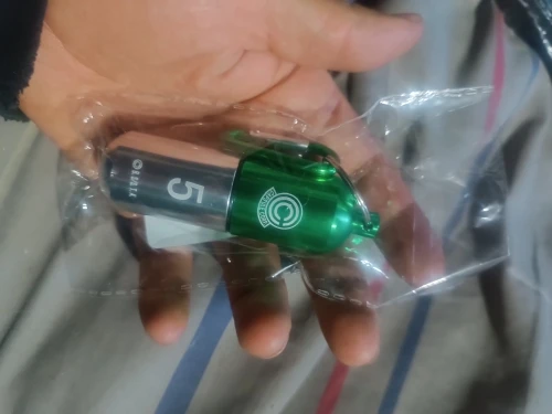 Foto de un comprador: Llavero de Dragon Ball de metal, organizador de pastillas portátil