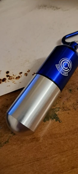 Foto de un comprador: Llavero de Dragon Ball de metal, organizador de pastillas portátil