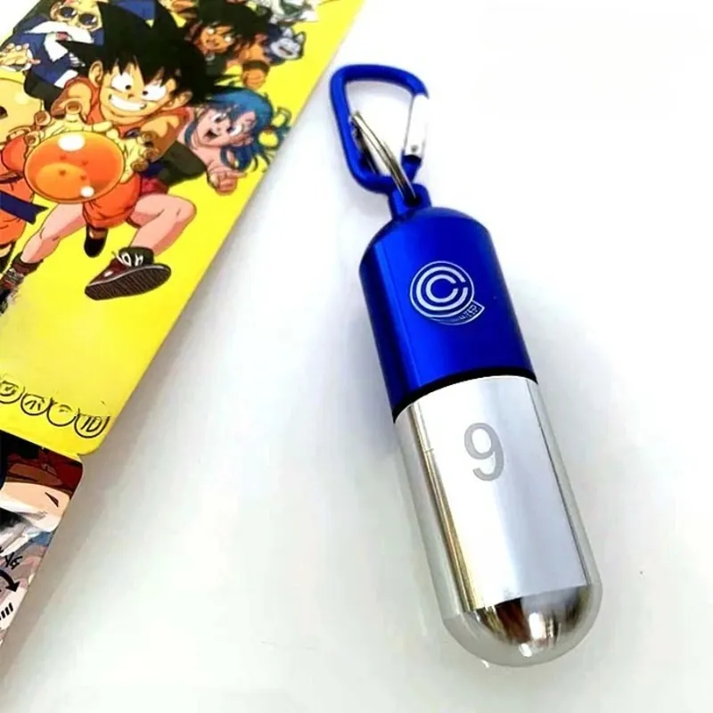 Llavero de Dragon Ball de metal, organizador de pastillas portátil – Cuélgala